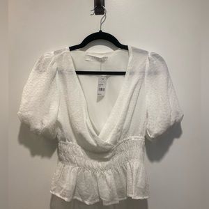 White flouncy top ASTR the label NWT